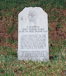 Taimah's grave marker, near, Kingston, Iowa. The image on the grave shows Taimah with a stylized Plains Indian headdress, which was not typical of his people's attire; the "Tama Indian Tribe" refers to the Meskwaki who lived at the Meskwaki Settlement. Taimah grave marker.JPG