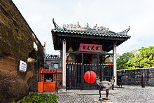 The remains of the city wall and Na Tcha Temple on the right Templo Na Tcha, Macao, 2013-08-08, DD 01.jpg