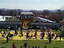 Local high school students perform Ningen Shogi, human Japanese chess on  top of Mt. Maizuru, in Tendo, Yamagata Prefecture on April 22, 2017. Tendo  is known for production of shogi koma,'' pieces