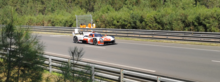 Photograph of a Toyota GR010 Hybrid driving on a race track