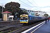 Train at Flemington Racecourse railway station, Melbourne.jpg