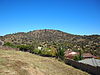 Tuggeranong Hill viewed from Chisholm March 2013.jpg