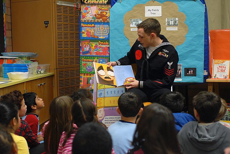 File:US Navy 100302-N-0718S-095 Cryptologic Technician (Interpretive) 1st Class David G. Burrell reads a Dr. Seuss book to students at George C. Marshall Elementary School during National Read Across America Day.jpg