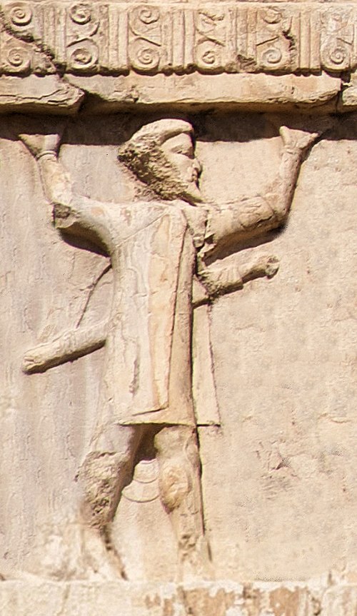 Ionian soldier (Old Persian cuneiform 𐎹𐎢𐎴, Yaunā) of the Achaemenid army, circa 480 BCE. Xerxes I tomb relief.