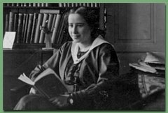 Photo of Hannah as a schoolgirl studying in the family library in 1920