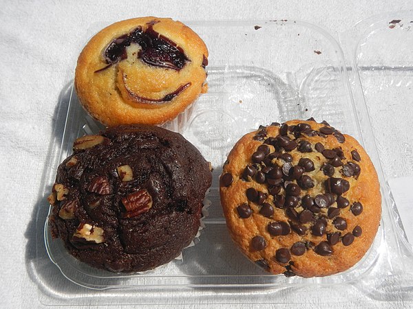 Three flavors of American muffin: blueberry, chocolate, and chocolate chip