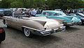 Cadillac Eldorado Biarritz (links, 1958) und Eldorado Seville (rechts, 1957)