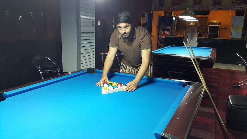 File:A person setting the cue-balls.jpg