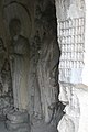 Ancient Buddhist Grottoes at Longmen- Jingshan Temple, Ananda & Bodhisattva.jpg