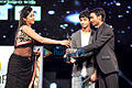 Catherine, Anirudh, Dhanush at 60th South Filmfare Awards 2013.jpg