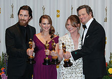 Several actors and actresses with "Oscar statuette" in hand. The award is issued by the Academy of Motion Picture Arts and Sciences. Christian Bale, Natalie Portman, Melissa Leo and Colin Firth 2011.jpg