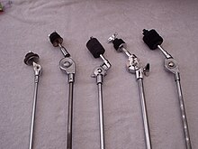 Five cymbal stand heads showing the button and mounting bolt Cymbal stand buttons and bolts.JPG