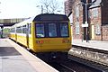 A Class 142 Pacer train terminates at Ellesmere Port from Helsby.