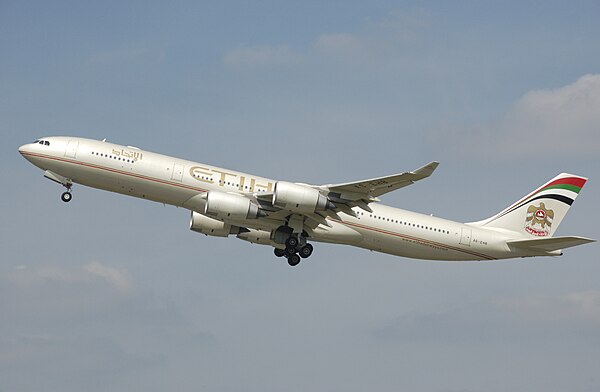 A now-retired Airbus A340-500 wearing the first livery (with the older UAE coat of arms)