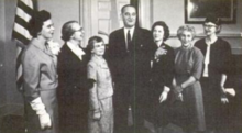 President Lyndon B. Johnson poses in the Oval Office with six winners of the 1964 Federal Woman's Award; from left to right: Elizabeth Messer, Evelyn M. Anderson, Gertrude Blanch, President Johnson, Patricia van Delden, Margaret Schwartz, and Selene Gifford FederalWomansAward1964.png