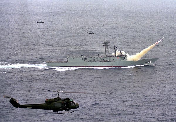 HMAS Canberra firing a Harpoon anti-ship missile