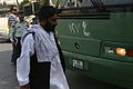 Haji Mohammad steps off a bus in Amman, Jordan, April 21, 2011 110421-M-GW940-007.jpg