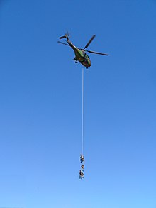 Soldiers suspended beneath a Puma helicopter Helicopter SA 330 Puma 007.JPG