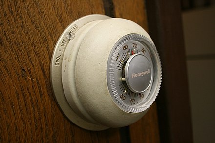 Honeywell's "The Round" model T87 thermostat, one of which is in the collection of the Smithsonian.