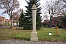 Saxon post mile pillar on the village square