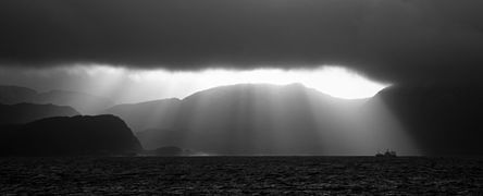 Crepuscular rays over Indre Fure in the Stad peninsula, Norway