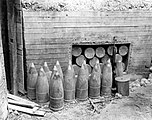 A captured ammunition bunker with 20 cm projectiles and shell cases on Guam.