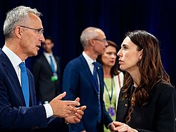 Jens Stoltenberg talked to Jacinda Ardern during the 2022 Madrid Summit (cropped)