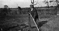 Eighty years old, and doing her bit in the garden.}}