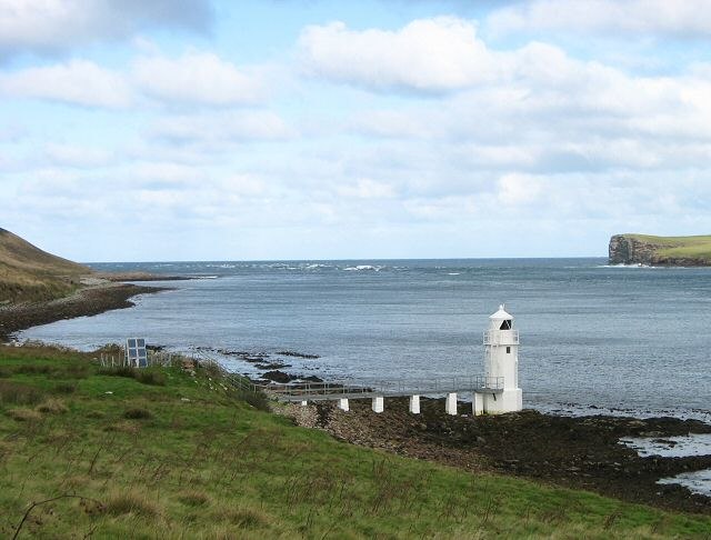 Lighthouse on Calf Sound, Eday. The land on the upper right of the picture is the northern tip of the Calf of Eday.