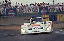 Lola B98/10 of Didier de Radigues, Tomas Saldana & Grant Orbelli at Ford Chicane at the 1999 24 Hours of Le Mans. Lola B98-10 - Didier de Radigues, Tomas Saldana & Grant Orbelli at Ford Chicane at the 1999 Le Mans (51909780458).jpg