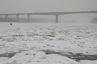 River ice breakup, Frozen Don River in snow storm