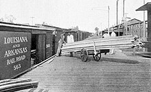 Loading lumber in Stamps, Arkansas, 1904 Louisiana and Arkansas Railway, Stamps, Arkansas.jpg