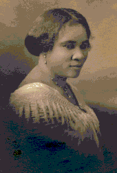 Madam C. J. Walker (1867-1919), popularizer of the straightening comb Madame CJ Walker.gif