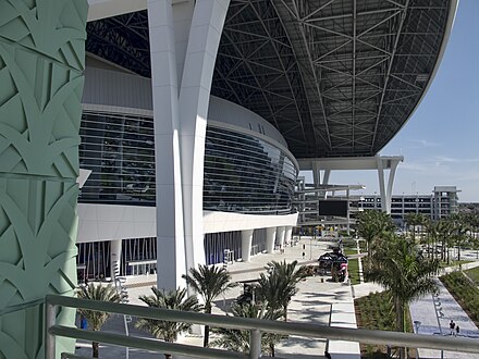 Marlins Park, now known as LoanDepot Park, has a contemporary, Miami-centric design with a sculptural glass and curved depiction of "water merging with land", Miami-Deco tiles, and a bright multi-color scheme.