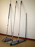 Mop handles From left: Classic yarn mop handle made of aluminium (thread mount), unadjustable aluminium handle for velcro mop (50 cm), unadjustable aluminium handle for velcro mop (60 cm), scale included for reference.