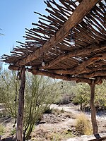 One of several ocotillo ramadas at Mission Garden