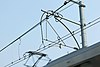 The multiple wires of an overhead line system in Japan, showing the carrier wire below and the catenary wire above it