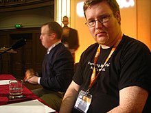 Stuart Langridge in foreground as a panelist at @media ajax 2007 conference Panelists Stuart Langridge and Brendan Eich (2051718680).jpg