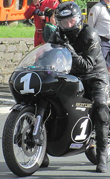 A modern racing classic-category motorcycle with a Peel-type fairing having enclosed handlebar ends Peel-type fairing.JPG