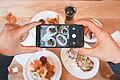 Person snapping food (Unsplash).jpg