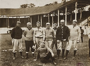 Members of the 1907 Boston Americans at West End Park for spring training, with Cy Young second from right Players at Boston Red Sox Spring Training in Little Rock Arkansas.jpg