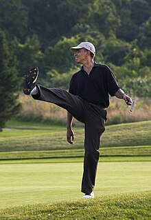 President Barack Obama playing golf at Farm Neck Golf Club, August 24, 2009. Official White House photo. President Barack Obama puts a little body English on his shot during a round of golf at Farm Neck golf course during his vacation on Martha's Vineyard.jpg