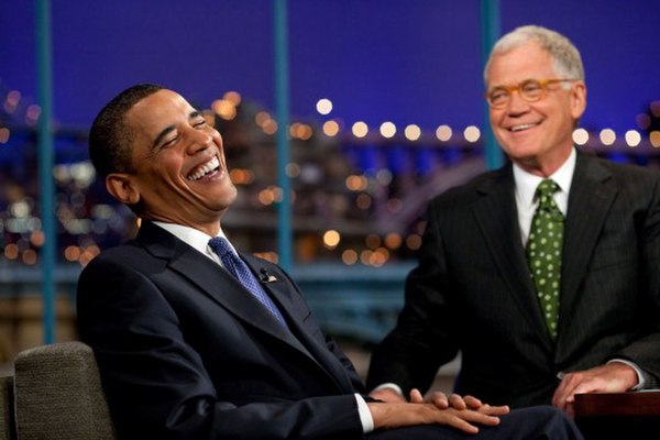 Late-night talk shows often feature guest interviews. Barack Obama (left) is seen here being interviewed by David Letterman (right).