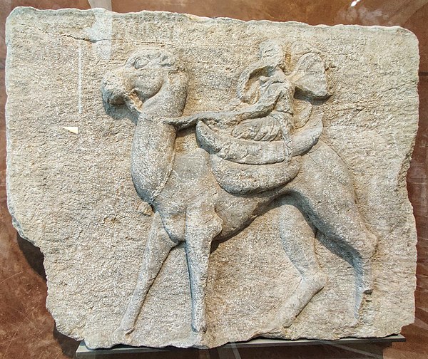 Psyche with butterfly wings mounted on a camel, at the Louvre