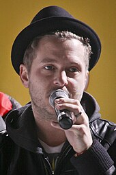 Ryan Tedder (pictured) co-wrote and co-produced "Welcome to New York" with Swift. Ryan Tedder OneRepublic Austria 1.jpg