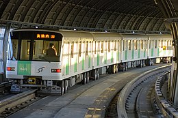 5000 series central rail-guided rubber-tyred rolling stock operated by Sapporo City Transportation Bureau, Japan, and built by Kawasaki Heavy Industries Rolling Stock Company ST SN5000 20061102 001.jpg