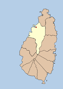 Castries saaren länsirannikolla (punainen piste) ja sen kunta vaaleankeltaisella.