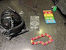 Sensory inclusive bag contents: Noise-cancelling headphones, KultureCity VIP tag, fidget toy and verbal cue card Sensory inclusive bag contents.jpg