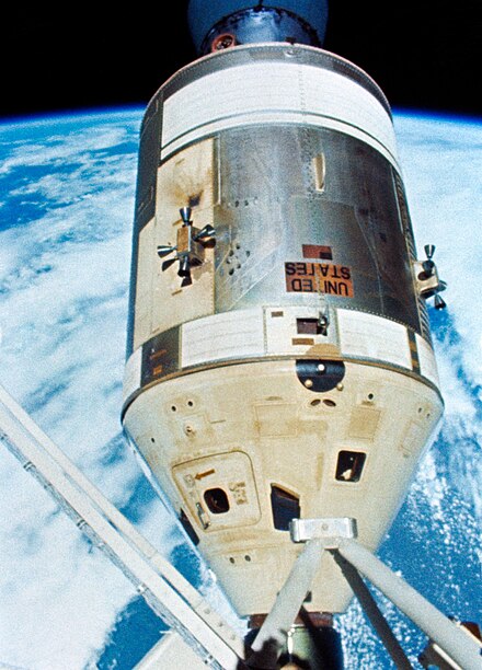 Apollo CSM in white for a Skylab mission, docked to the Skylab space station