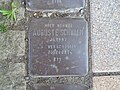 der Stolperstein für Auguste Schwalm vor dem Haus Am Angel 11 in Treysa